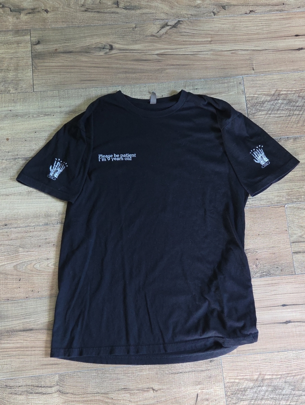 Next Level Apparel | Black Graphic Tee with Sleeve Print